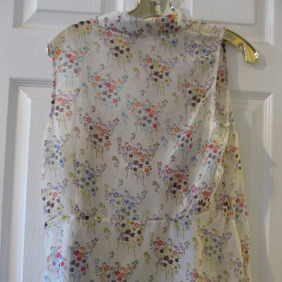Cute CAbi Floral Semi Sheer Sleeveless Top with a built-in camisole - Picture 2 of 9
